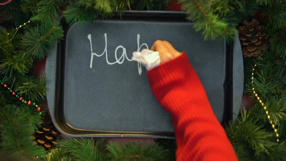 Happy New Year, Female Hand Writing Word With Cream on Baking Tray, December alt