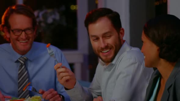 Group of businesspeople having meal alt