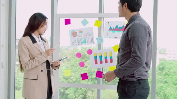 Business People Work on Project Planning Board alt