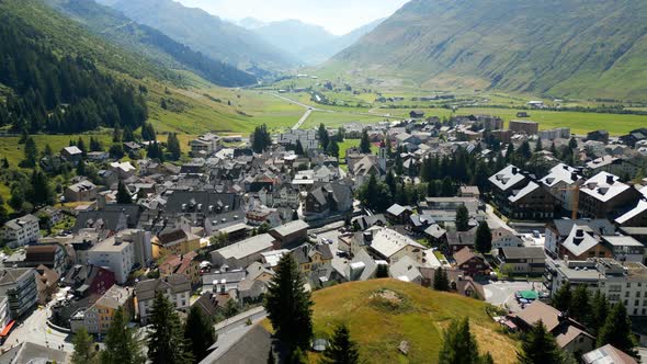 Flight Over the Village of Andermatt in Switzerland  Aerial View alt