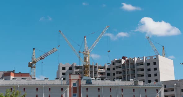 Time Lapse of Building Under Construction Crane and Beautiful Clouds No Birds alt