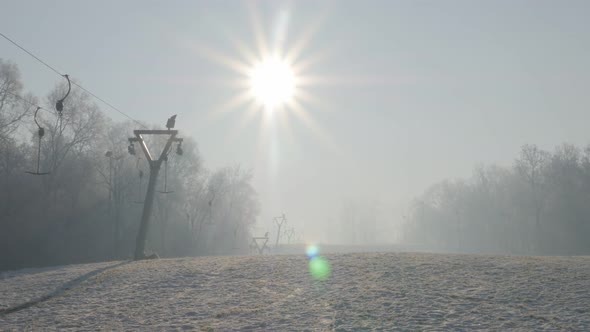 Foggy early morning day on Kraljevica hill ski slopes  4K 2160p UHD footage - Ski slopes near Easter alt