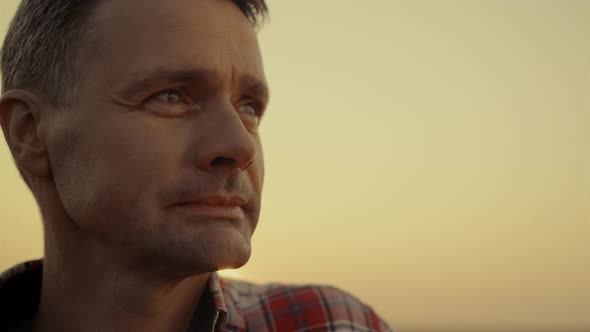 Portrait Farmer Looking Field at Golden Sunset Close Up alt