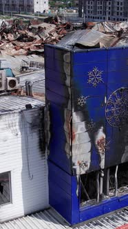 Vertical Video of a Burnt Shopping Center During the War in Bucha Ukraine alt