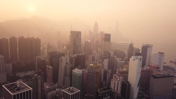 Modern Skyscrapers In Hong Kong City. buildings in Hong Kong city on sunrise. alt