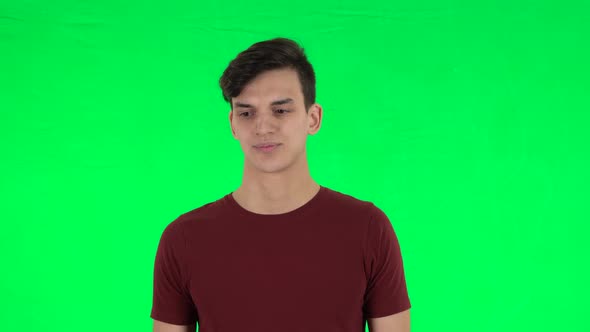 Guy Focused Thinks About Something. Green Screen alt