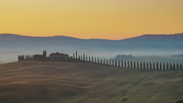 4K Timelapse Sunrise over the rolling hills in Tuscany countryside , Italy