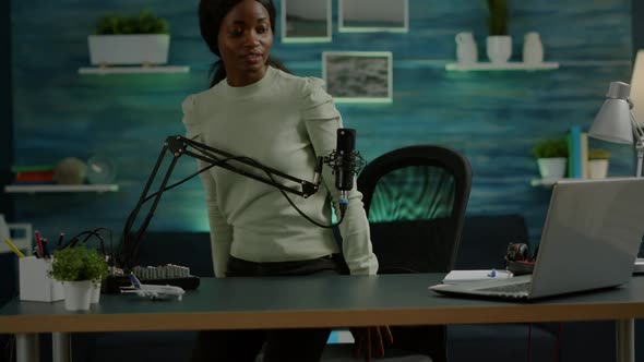 Portrait of African Vlogger Working in Cozy Studio alt