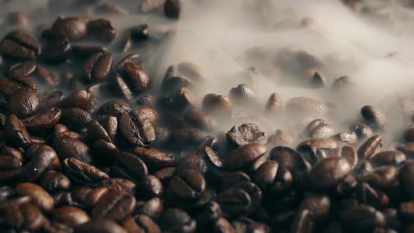 Smoke Wafting Over Roasted Coffee Beans alt