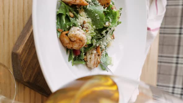 Woman Eating Salad with Poached Egg alt