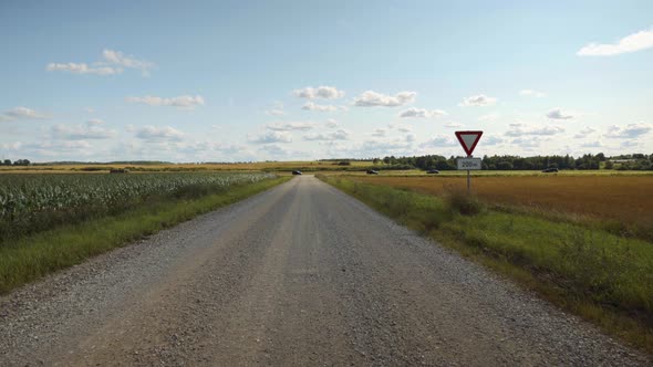 Gravel road junction with highway