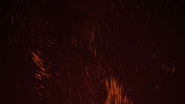 Floating fire particle sparks footage 4K animation of fiery orange glowing flying ember burning