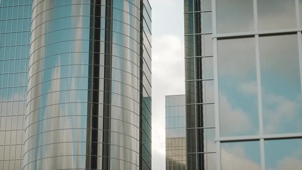 4K Video animation. Modern glass high-rise buildings. Industrial architecture concept. alt