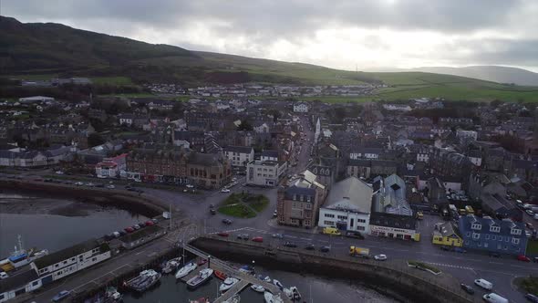 Flyover Campbeltown marina and docks following along Main Street alt