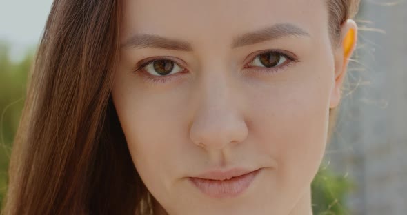Close Up View of White Woman Looking to Camera alt