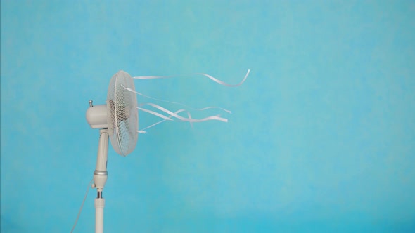 Electric Fan on Blue Background alt