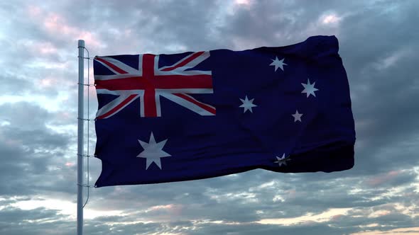 Realistic Flag of Australia Waving in the Wind Against Deep Dramatic Sky.  UHD 50 FPS alt