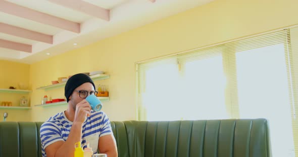 Man having coffee alt