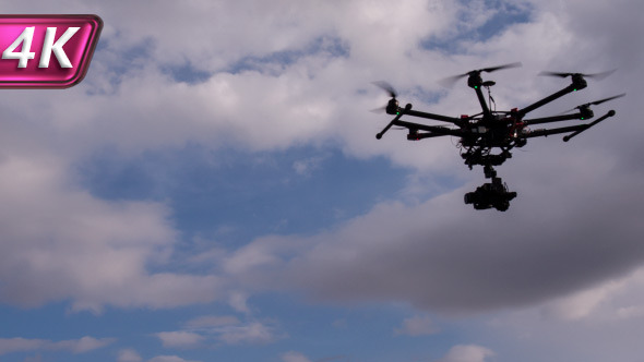 Copter Hovers Above the Ground alt