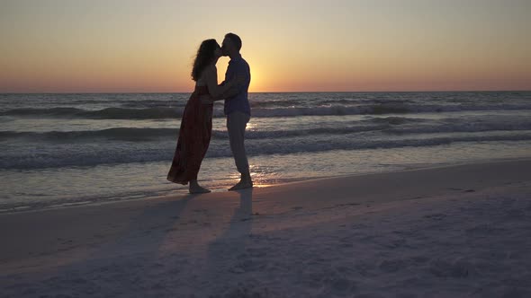 Couple Walking On Beach At Sunset (8 Of 23) alt