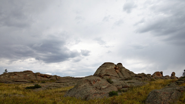 Wild Landscape With Rock And Clouds