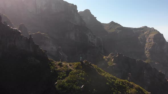 Man Hiker Standing on the Edge of a Cliff in the Mountains of Madeira Island, Portugal