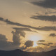 Sunset Over Hill and Fluffy Clouds - VideoHive Item for Sale
