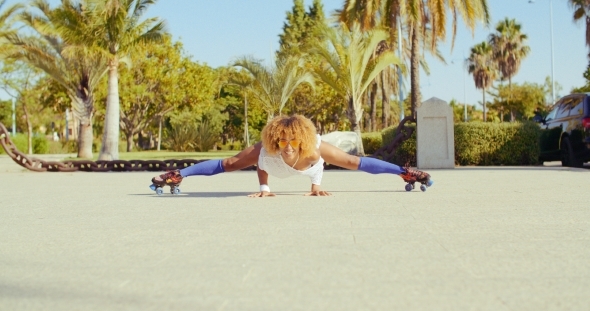 Sexy Flexible Girl Doing Splits On Roller Skates alt