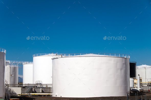 White storage tanks Stock Photo by elxeneize | PhotoDune