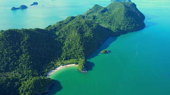 An aerial view of the coast, mountains with many beautiful islands alt