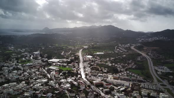 View from drone on full of yachts Bodrum harbour and ancient Kalesi castle in Mugla in Turkey alt