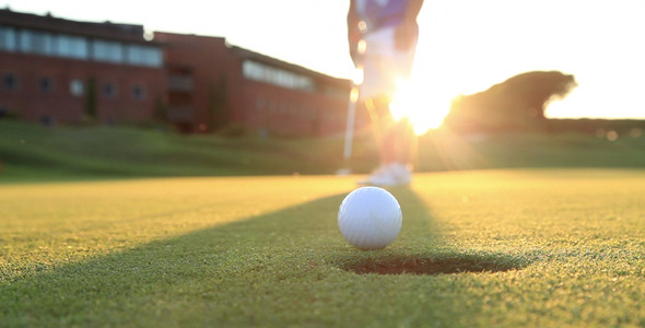 Playing Golf At Sunset