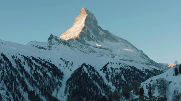 Matterhorn Mountain in Winter Sunny Morning at Sunrise. Swiss Alps. Switzerland. Aerial View alt