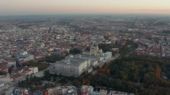 Descending Footage of Royal Palace and Almudena Cathedral at Dusk alt