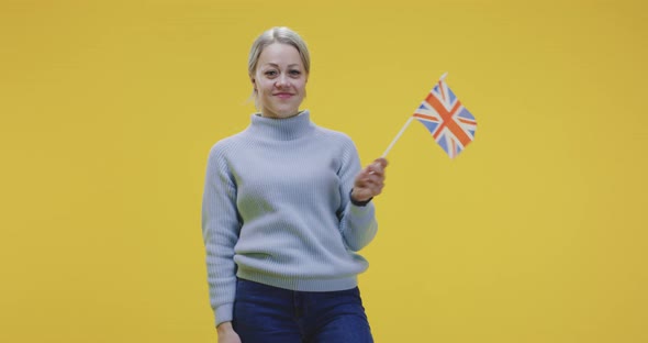 Woman Waving British Flag alt