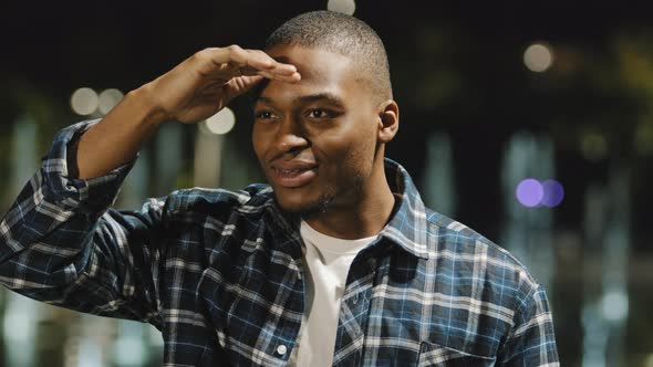 Male Portrait in Night City African American Guy Man Stands in Evening Street Looking Around Sad alt