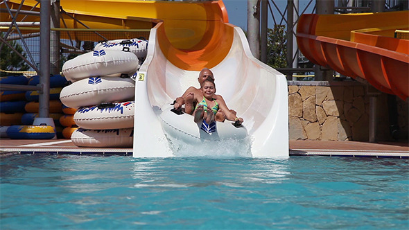 Grandpa With His Granddaughter Have Fun in Water P