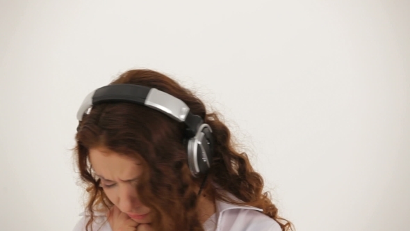 Woman In Earphones And White Shirt 