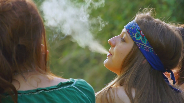 Hippie Girl Smokes Cigarettes