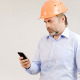 Engineer Browsing on Smartphone - VideoHive Item for Sale