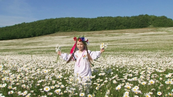 Cute Girl In Having Fun In The Field Of Chamomiles