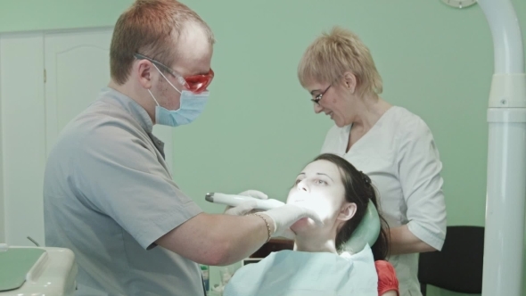 The Dentist Treats Tooth The Dentist Treats Tooth