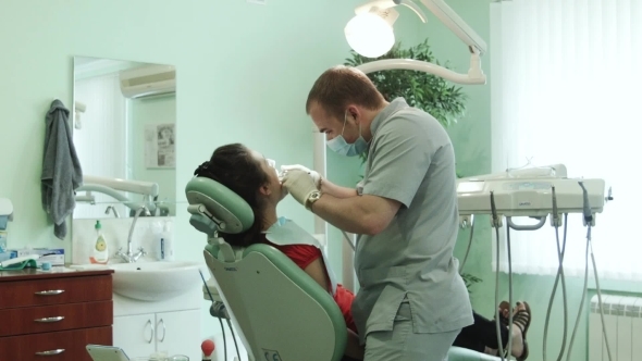 The Dentist Treats Tooth The Dentist Treats Tooth