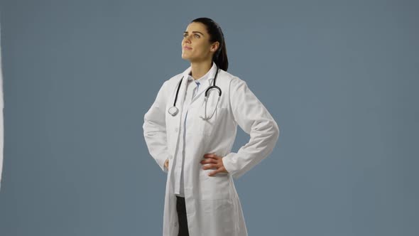 Young doctor in a lab coat alt