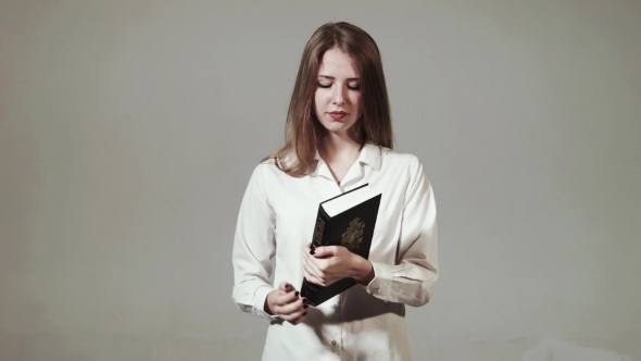 Young Christian Girl Reads The Bible Young Christian Girl Reads The Bible