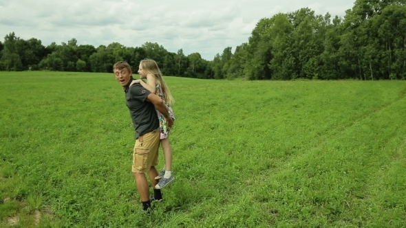 Father Playing With His Daughter In Field  alt