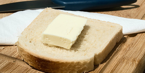 Butter Melting On A Slice Of Bread alt