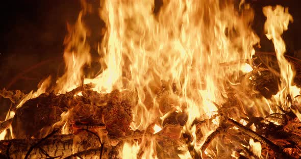 Burning Bonfire Fire Flames and Sparks Close Up Shot at Midsummer Night alt