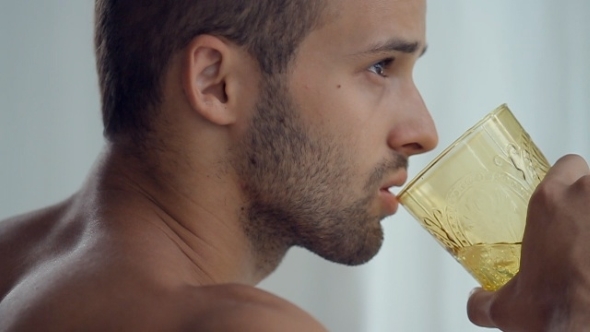 The Bearded Shirtless Man Standing Near The Window The Bearded Shirtless Man Standing Near The Window