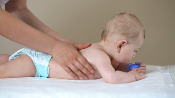 Newborn Baby Getting Oil Massage Newborn Baby Getting Oil Massage